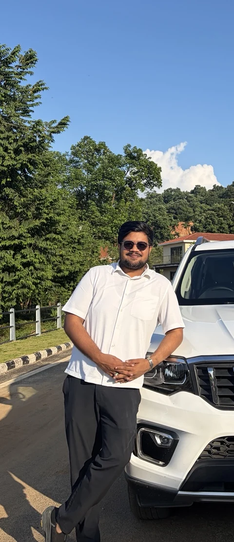 Mohammad Afridi outdoors in a white shirt